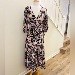 Fun and flirty wrap styled dress!
